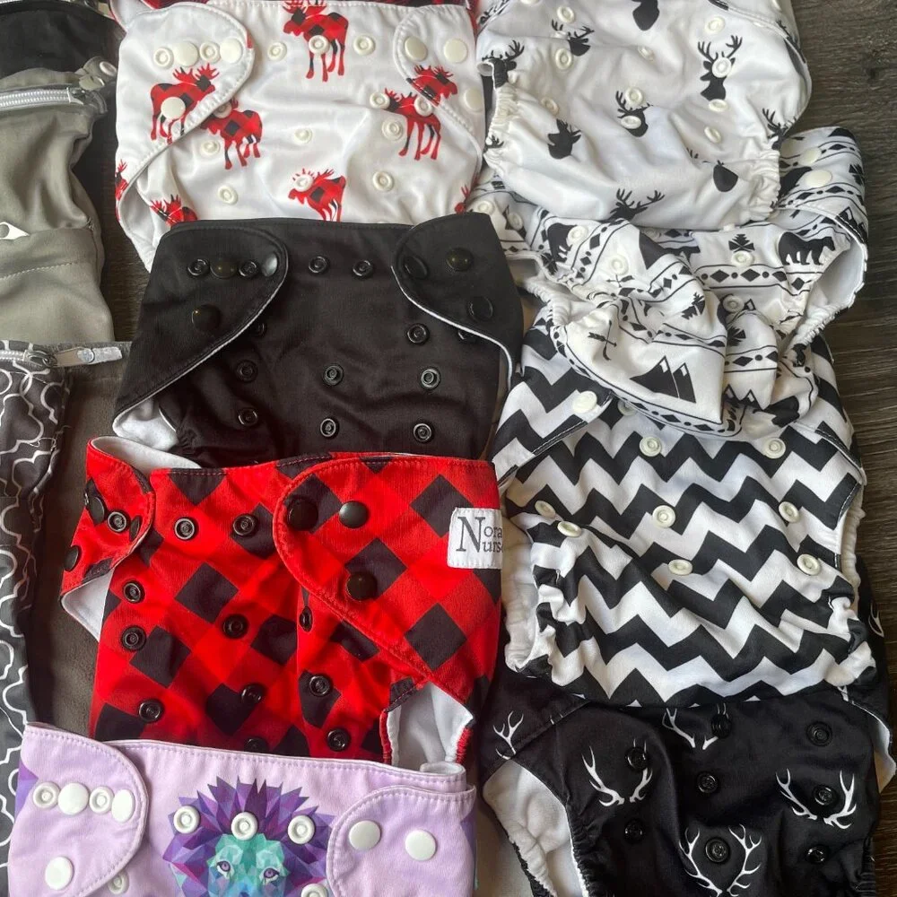 REUSABLE/ ADJUSTABLE BABY DIAPERS: 9 Cloth Diapers And 3 Diaper Bag